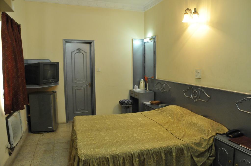 Hotel Heera Kolkata Rom bilde