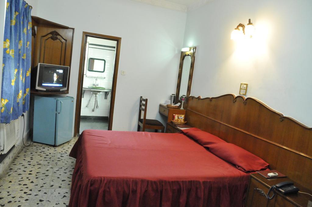 Hotel Heera Kolkata Rom bilde