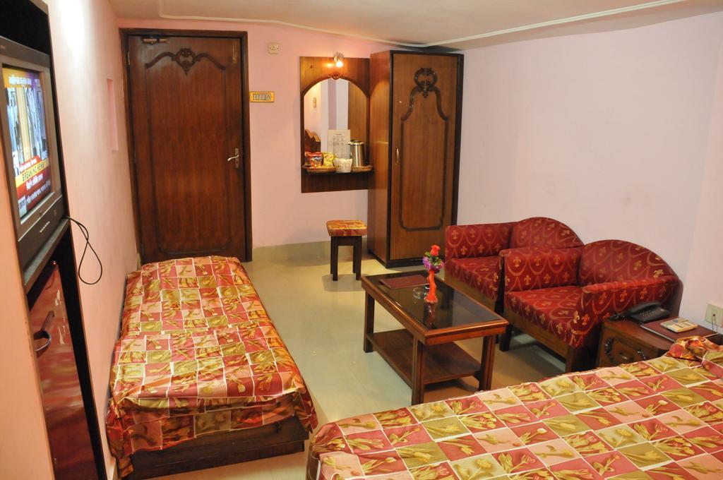 Hotel Heera Kolkata Rom bilde
